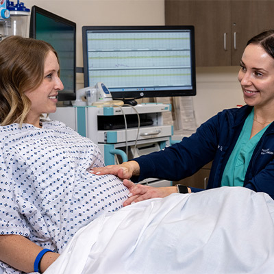 gynecologist with pregnant patient