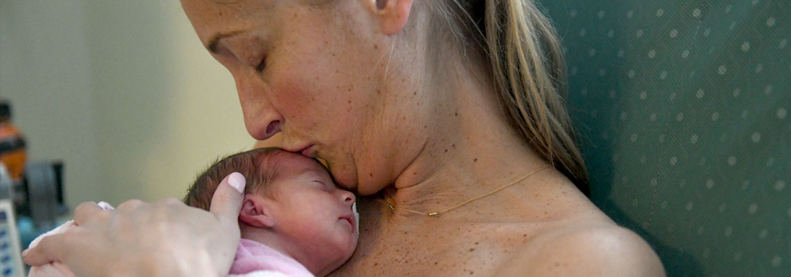Woman with Newborn Baby