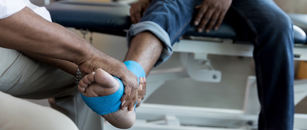 ankle and foot specialist with patient