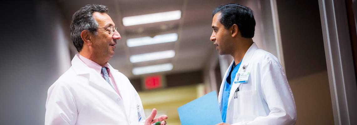 two urology providers interacting