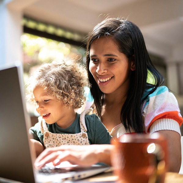 mother with child on a laptop