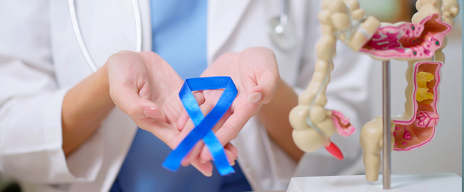 Hands holding blue ribbon