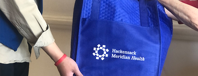 Handing off Groceries Photo