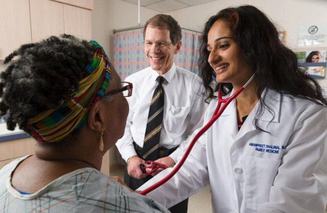 Doctors Examining Patient