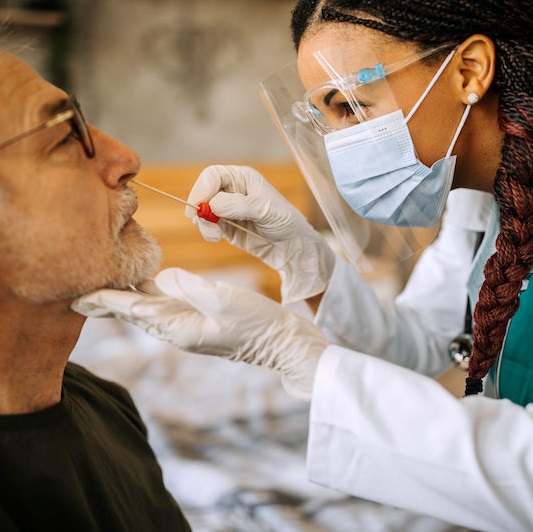 physician performing allergy test on a patient