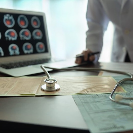 doctor looking over scans