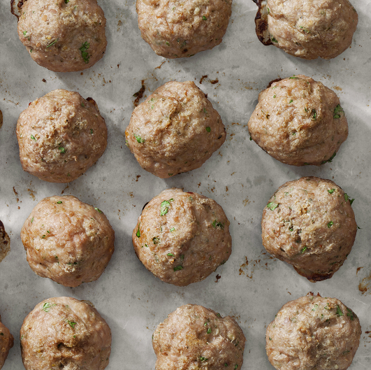 meatballs on baking sheet