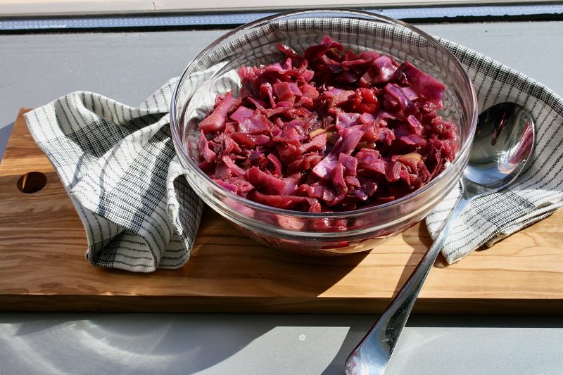 Close up shot of a bowl of cooked red cabbage for a salad.