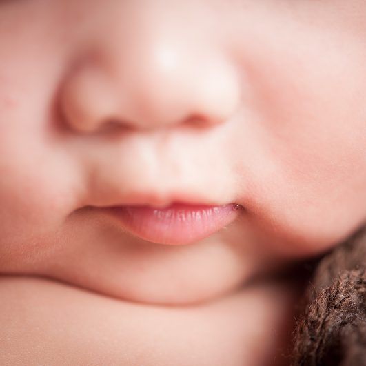 Close up of baby's mouth - concerns for lip or tongue tie