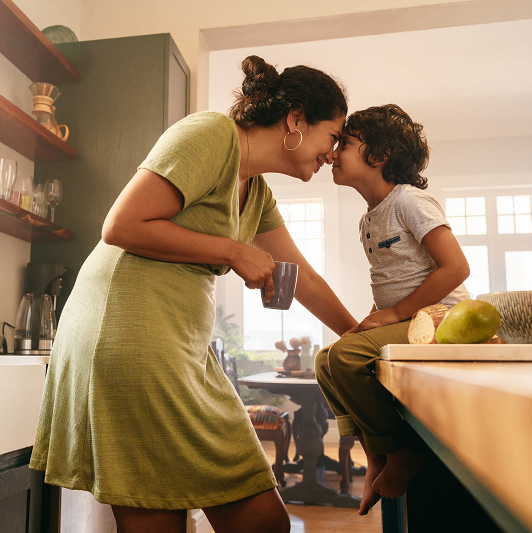 Mother and child in the kitchen bonding and connecting