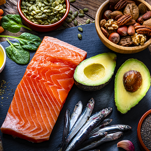 Table of food of the Mediterranean diet - salmon, nuts, avocado 