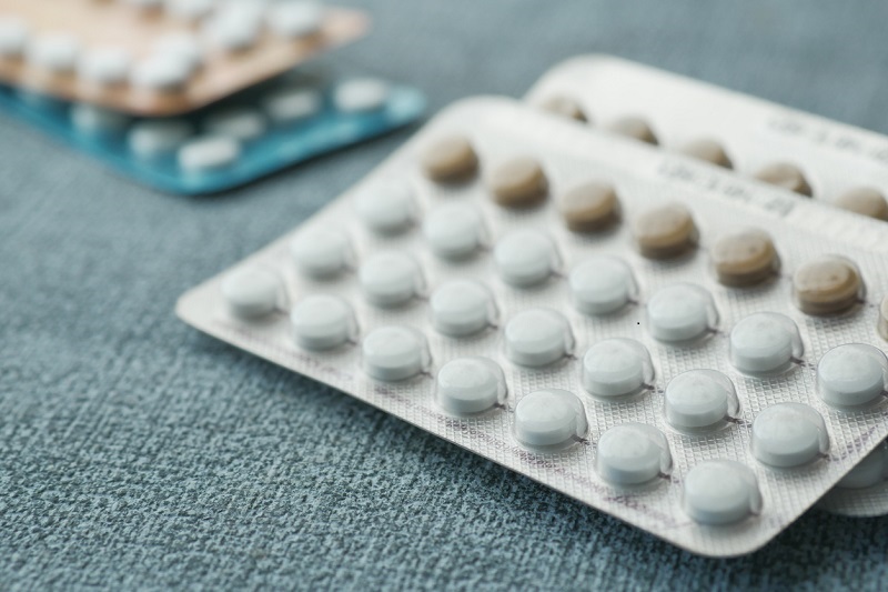 A close up shot of a birth control pill packet.
