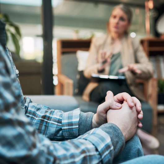 Cropped shot of a man having a therapeutic session with a psychologist