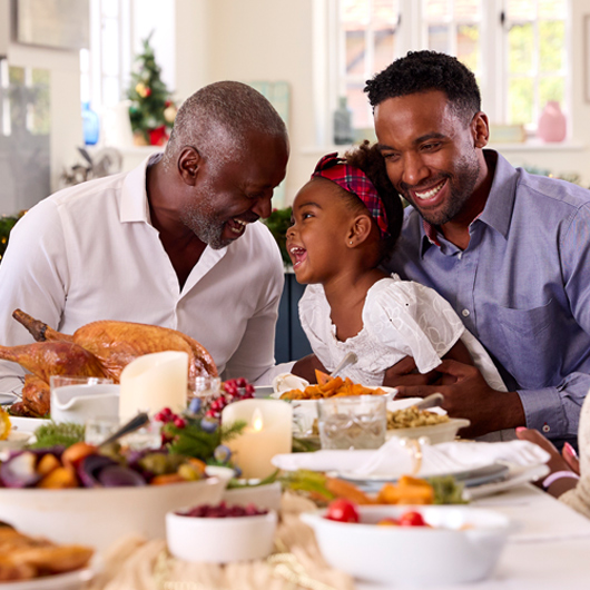 Family Eating Thanksgiving Dinner