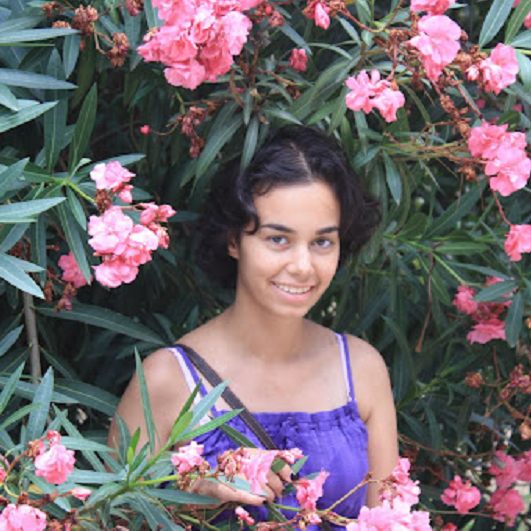 Jillian Lauren Gorman in the midst of flowers