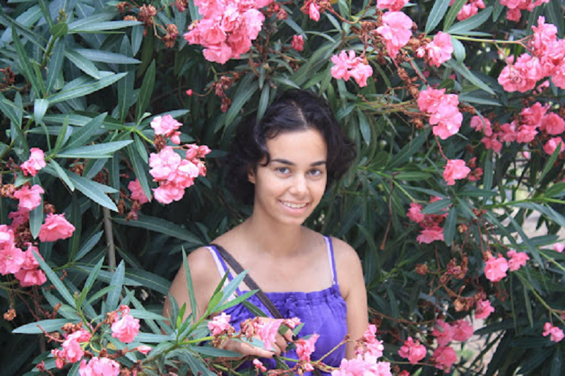 Jillian Lauren Gorman in the midst of flowers