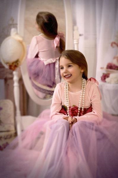 girl playing dress up