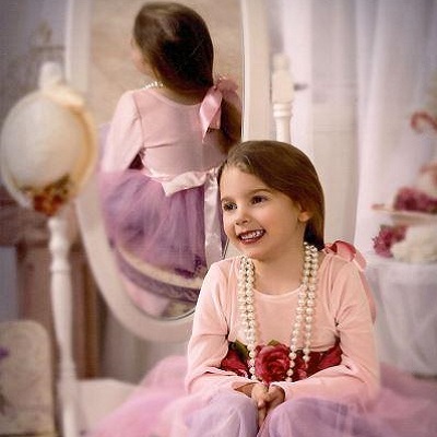 girl playing dress up