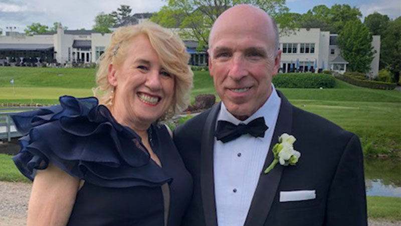 Tom Duffy smiling at a formal event.