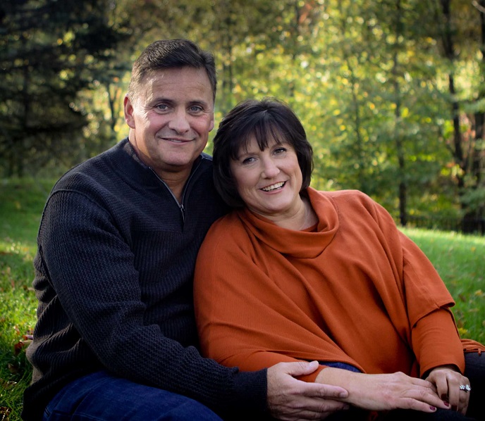 The Hennessys sitting outside