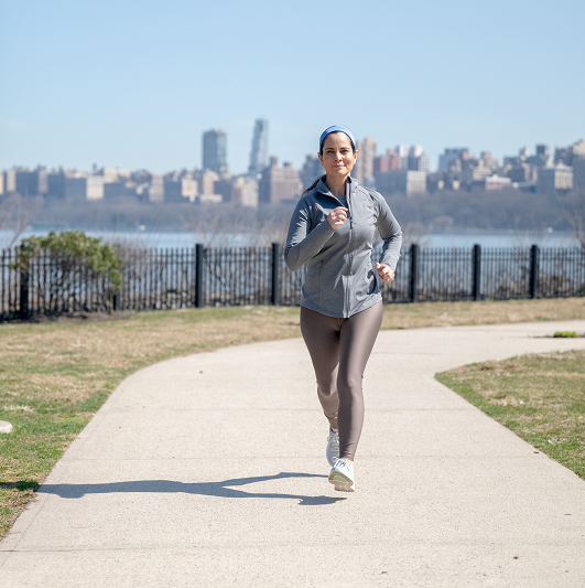 Shari Kessler on a run after two surgeries to treat herniated disks in her back.