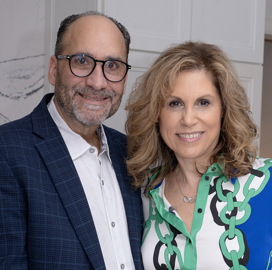 Kally Durso and her husband smiling.