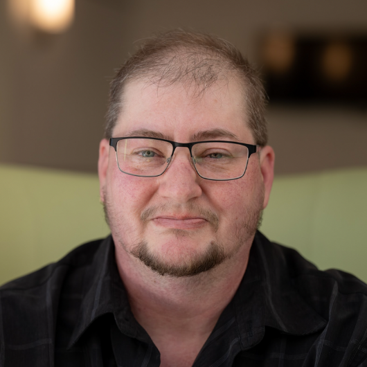 49-year-old Logan Gammons looks at the camera.