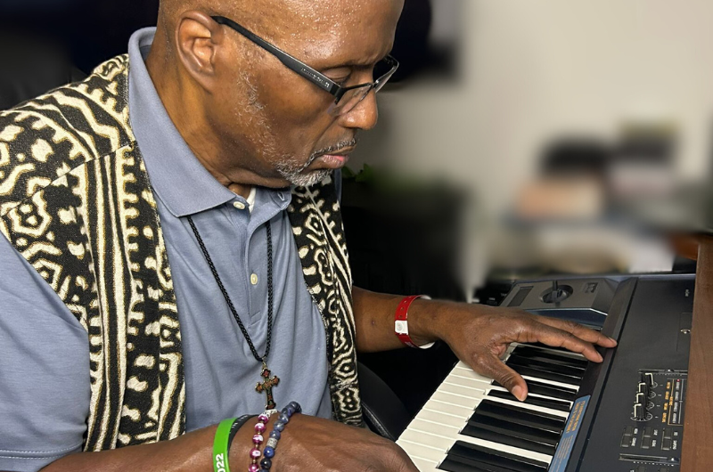 Troy Randall , a 61-year-old Smyrna, Delaware resident, sits and plays music on a keyboard.