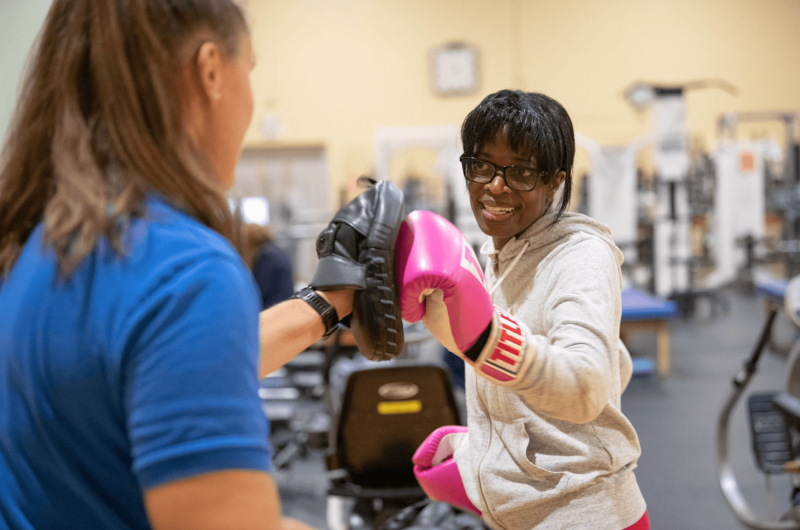 63-year-old Plainfield, New Jersey, woman Pat Dunstan boxes with a trainer.