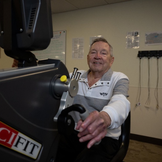 88-year-old Don Squier uses a cardiac rehabilitation machine. 