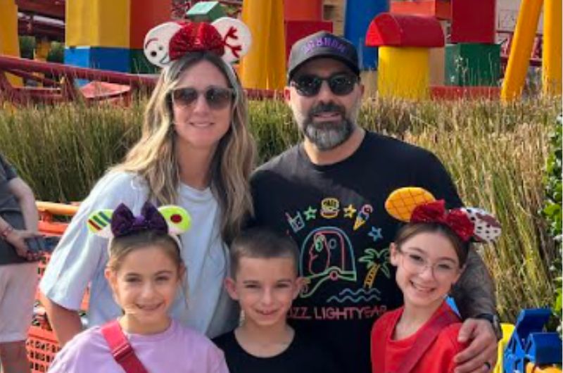 Young woman holding pregnancy test with negative result