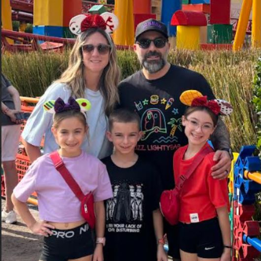 Young woman holding pregnancy test with negative result