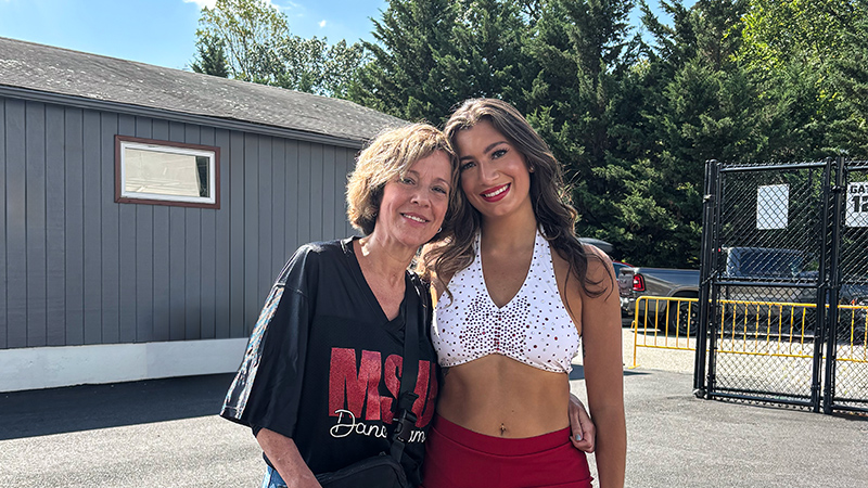 Hackensack Meridian Health patient, Erika Sharples, posing with her daughter at a dance competition.
