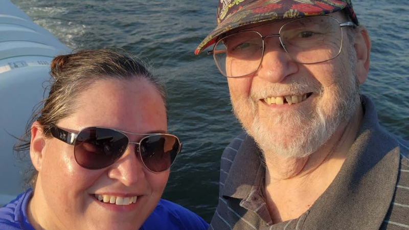 Image shows Hackensack Meridian Health patient, Tony Wozniak posing on a boat with his daughter.