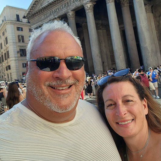 Image shows Hackensack Meridian health patient, Alex Scherer posing for a selfie with his wife.