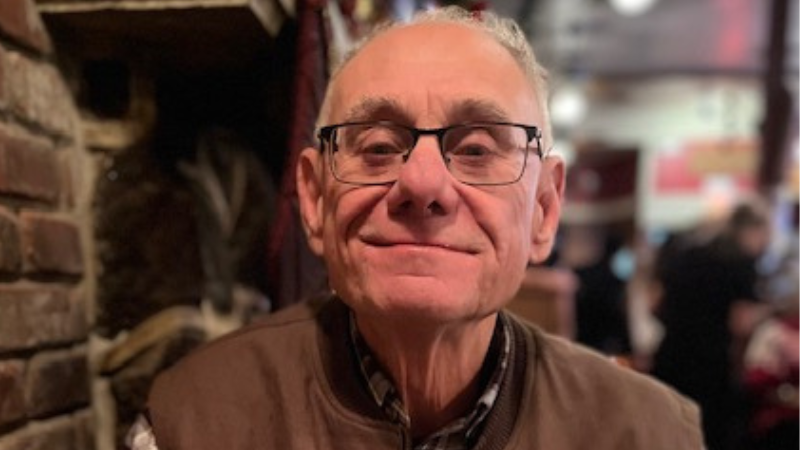 Timothy Asprocolas, an active 73-year-old from Holmdel, smiles at the camera.