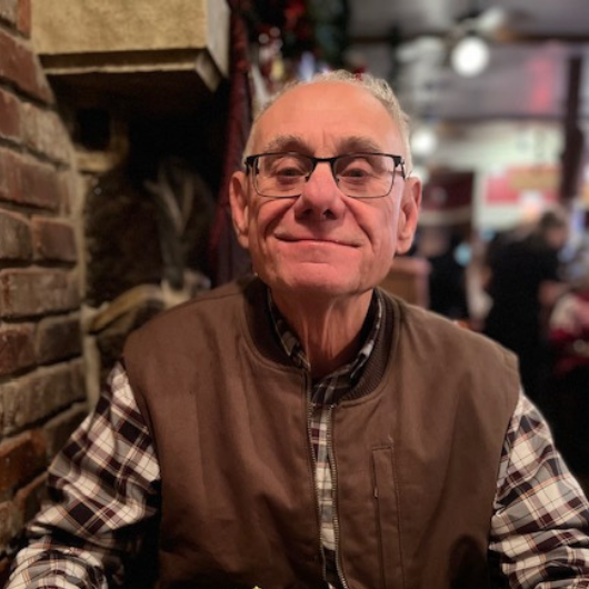 Timothy Asprocolas, an active 73-year-old from Holmdel, smiles at the camera.