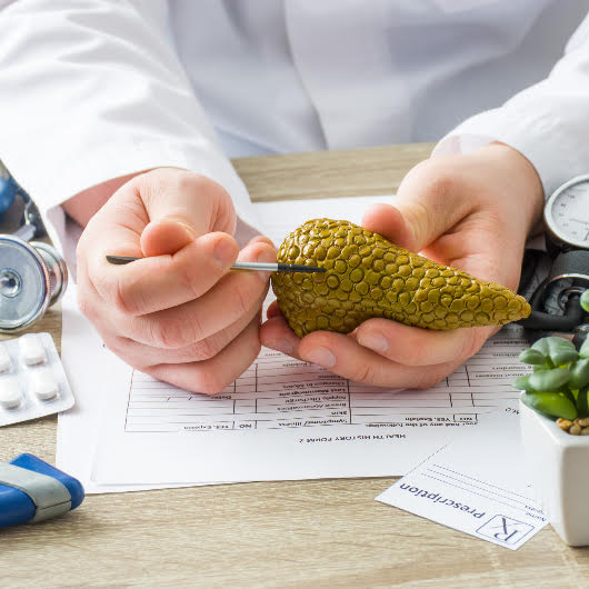 Doctor explaining to patient about pancreatic cancer. 