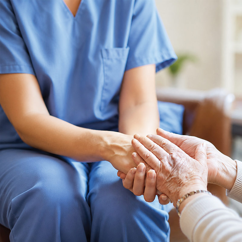 Hands joined in compassionate care
