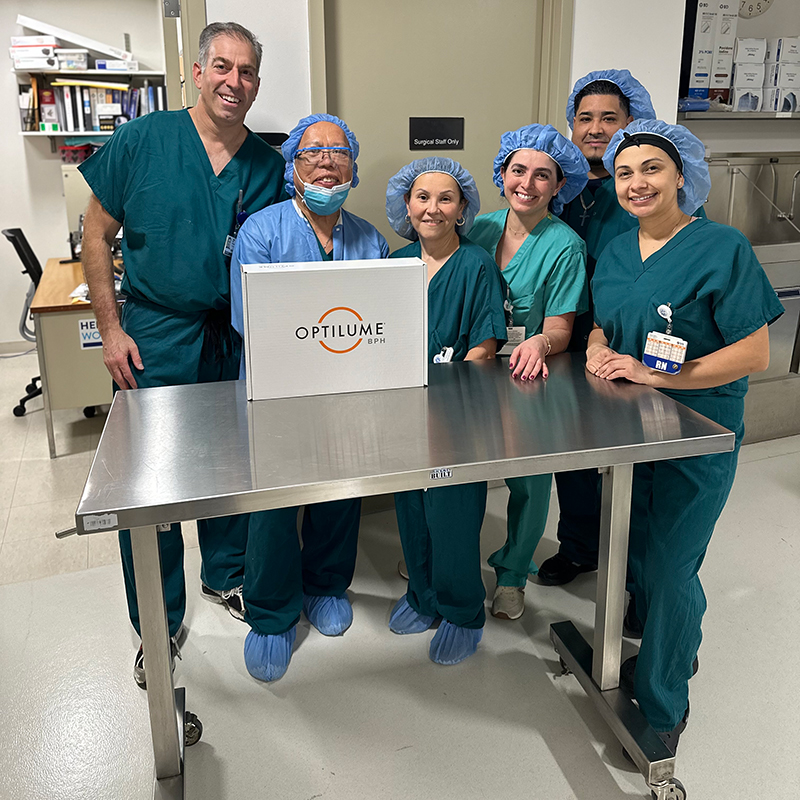 Staff showcasing Optilume BPH Catheter System