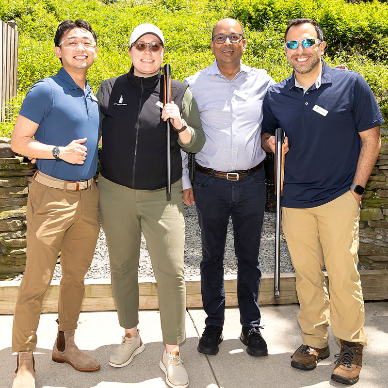 school medicine team members playing golf