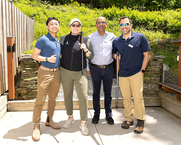 school medicine team members playing golf