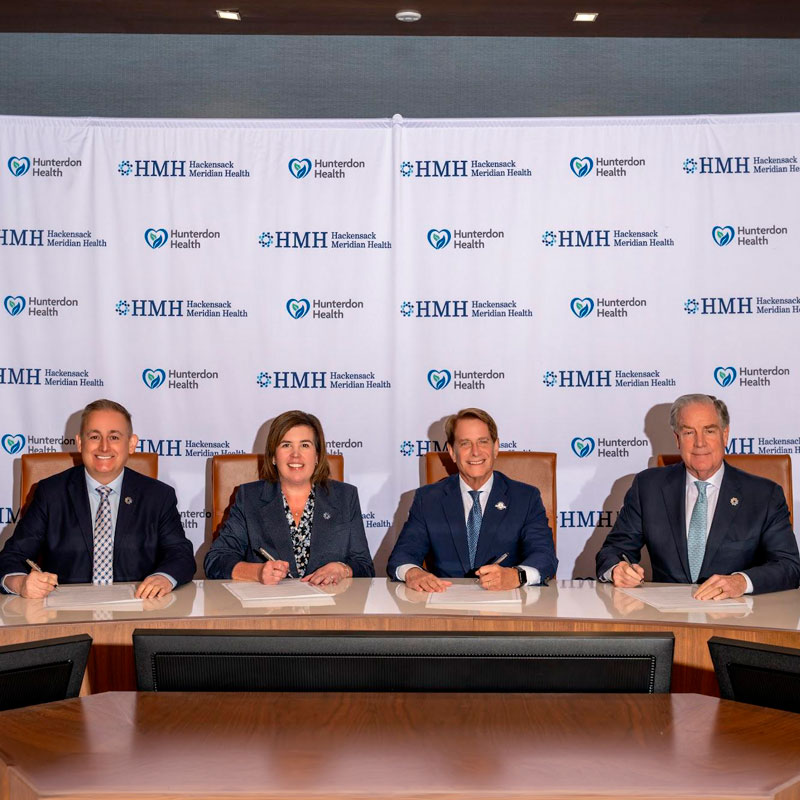 HMH and Hunterdon Health leaders signing merger agreement