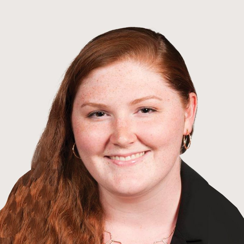 Women with long red hair wearing a black shirt