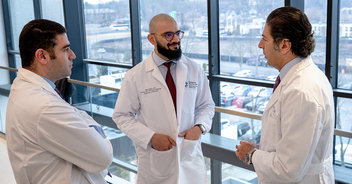 Three doctors in discussion