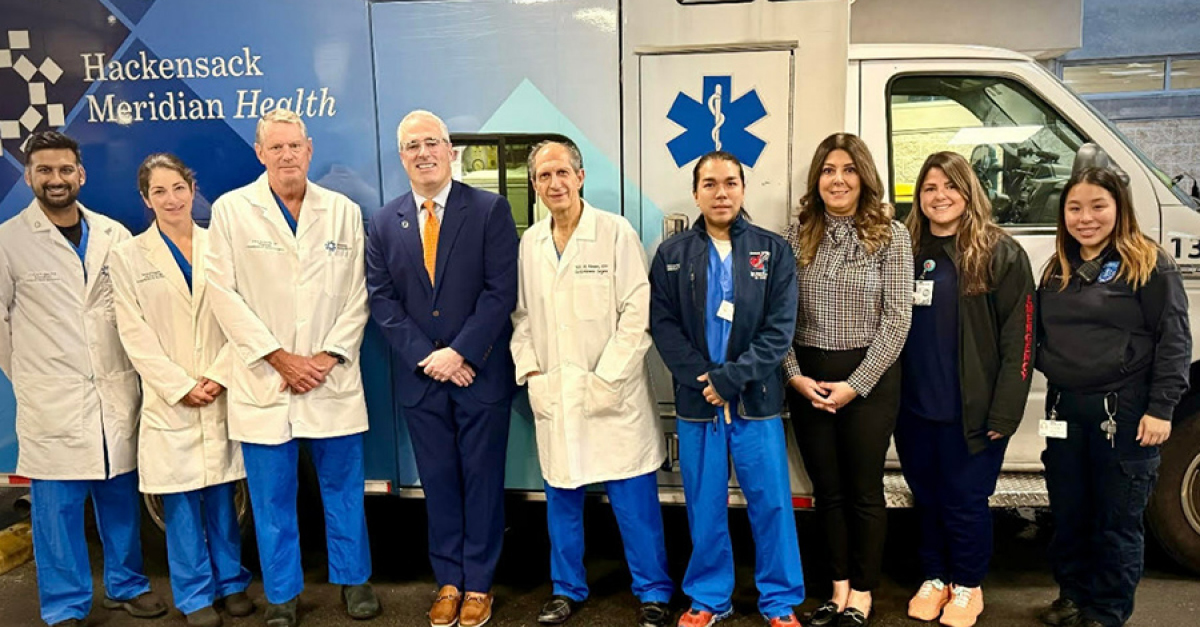 Medical team in front of ambulence