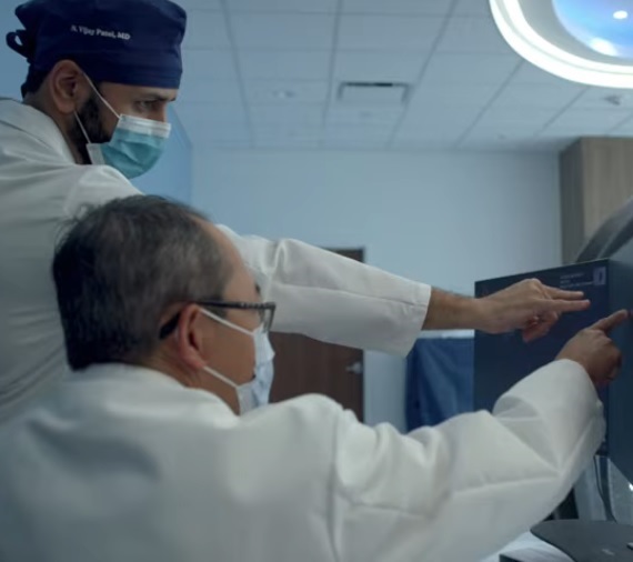 doctors looking at a screen