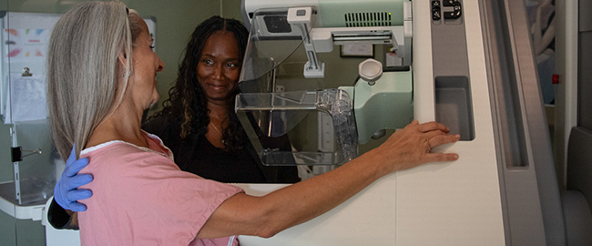 Patient receiving a mammogram and the JFK Women's Center.