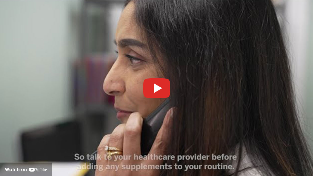 Woman talking to healthcare provider on phone about supplements