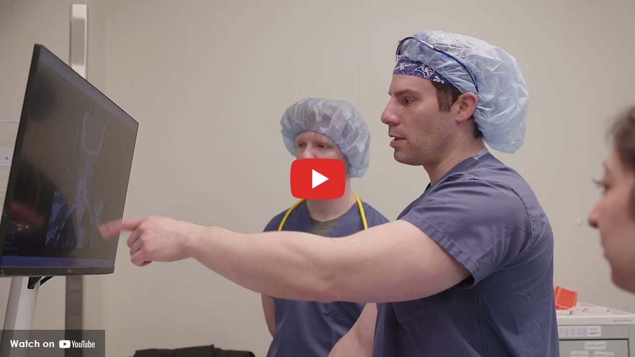 Anesthesiology residents reviewing medical imaging